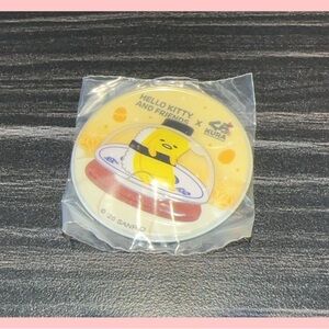 Sanrio Gudetama x Kura Yellow Button Pin